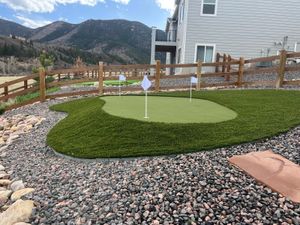 Backyard artificial putting green with mountain view in Denver area