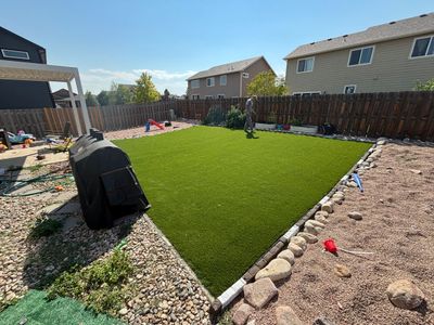 Backyard turf with rock edging
